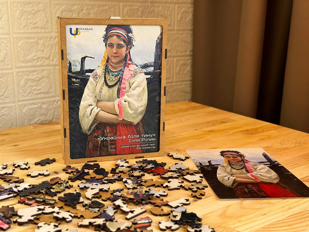 Ukrainian Girl by a Fence. Illya Repin